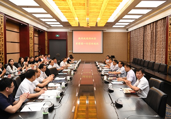 Xilin county and SXU work on volunteer teaching project