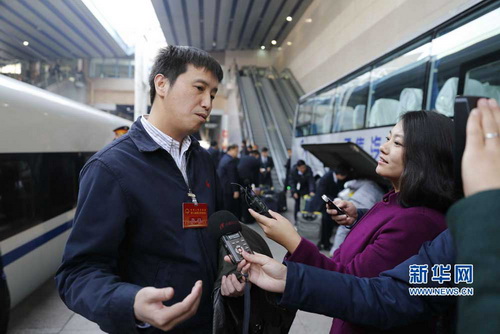 Shanxi deputies to the 12th National People's Congress (NPC) arrive at Beijing