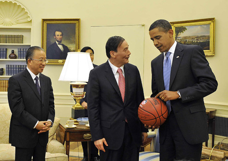 Obama presents basketball as gift to Wang Qishan