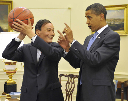 Obama presents basketball as gift to Wang Qishan