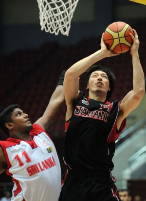 Unbalanced Asian basketball tests tolerance of fans and hosts