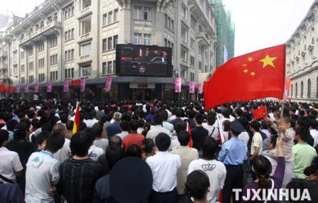 People from all walks of life watch parade