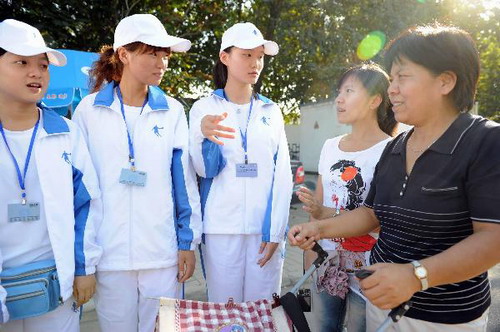 Volunteers start to offer services for 2010 Summer Davos Forum