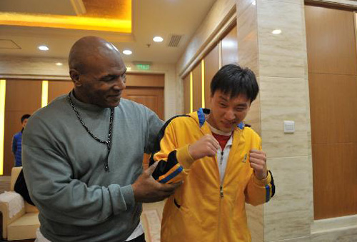 Former world boxing champion Mike Tyson visits N China