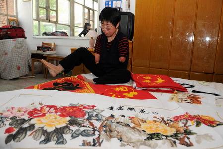 Armless embroiderer heads to Expo for exhibition