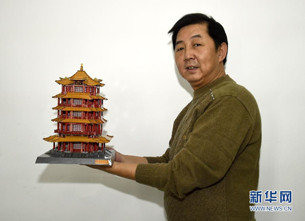 Tianjin artist creates modern-traditional paper models