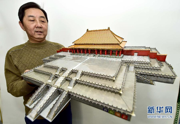 Tianjin artist creates modern-traditional paper models