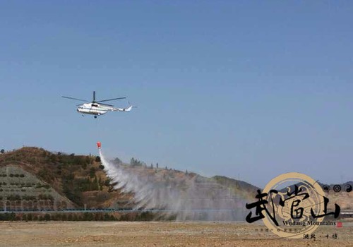 Wudang's forest guard helicopter takes maiden flight with bucket