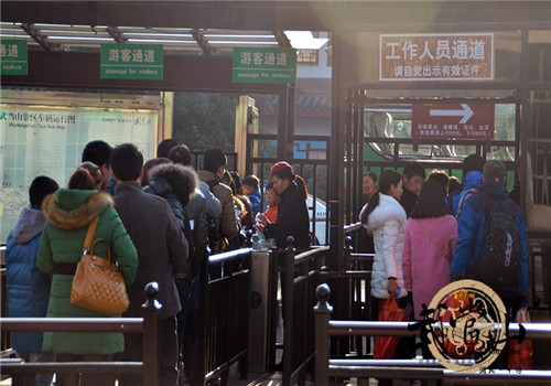 Visitors go to pray in Wudang