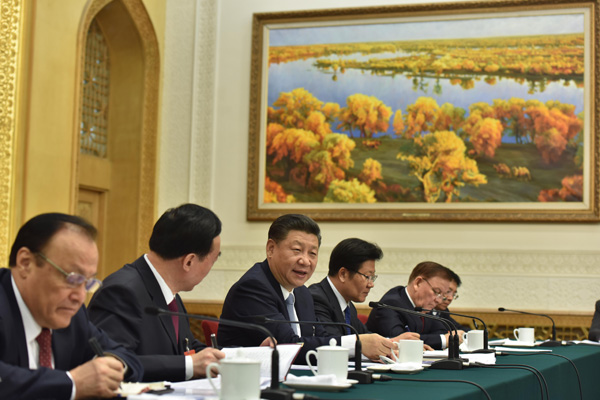 Xi calls for building 'great wall of iron' for Xinjiang's stability