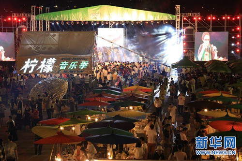 Visitors flock to Yunnan's rainforest rock music festival