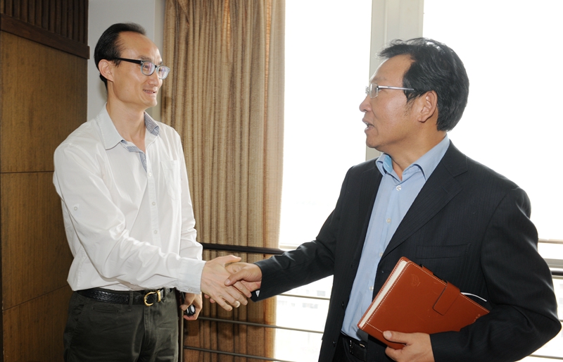 Kunming High-Tech Zone director talks with Unisplendour Corp