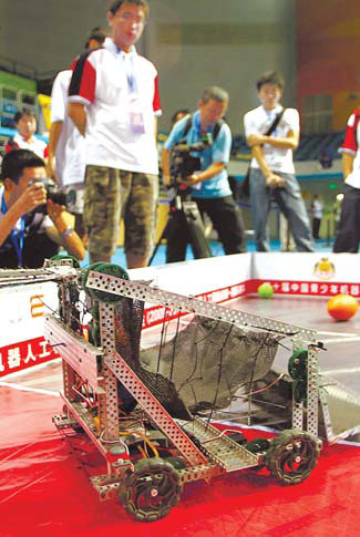 Student scores with her robot footballer