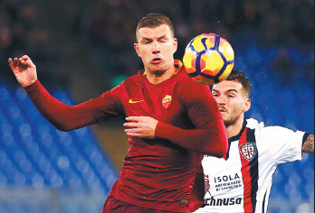 Roma keeps Edin in right direction