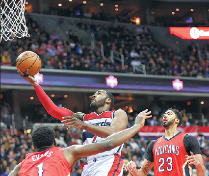 Wizards conjure late magic to stretch streak