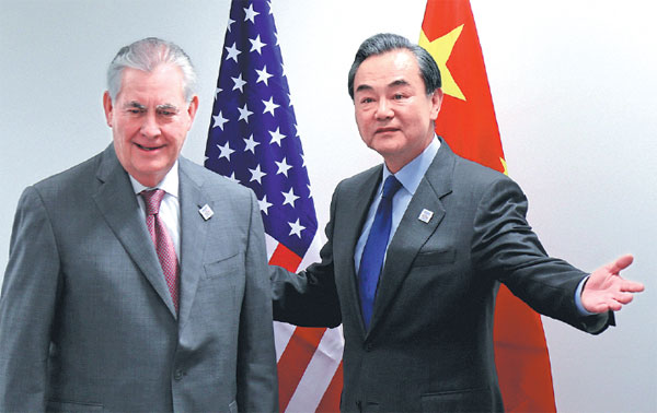 Upbeat tone marks Wang, Tillerson talk