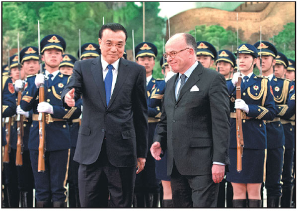 China, France vow to safeguard free trade