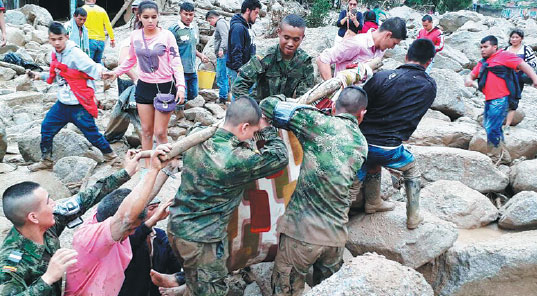 Mudslides kill more than 200, sweep homes away