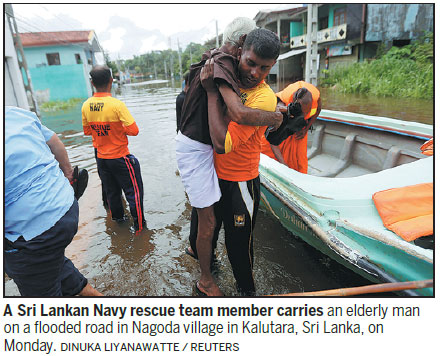 Sri Lanka races to rescue flood victims before rain resumes