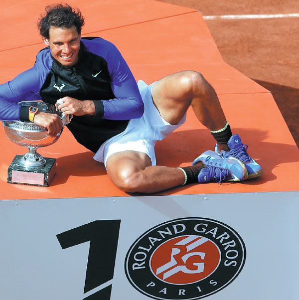 Reborn Rafa romps into history