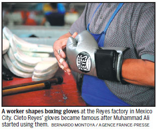 Handcrafted gloves still a hit with boxing stars