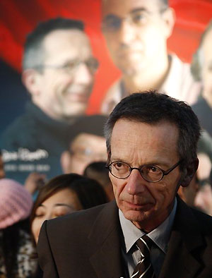 Patrice Leconte of France listens to a question during the Vision Beijing news conference in Beijing February 24, 2008. The Vision Beijing project showcases five short films by five world famous film directors namely Majidi, Giuseppe Tornatore of Italy, Patrice Leconte of France, Daryl Goodrich of Great Britain and Andrew Lau Wai-Keung of Hong Kong. The short films are about Beijing and the people's preparations for the 2008 Olympic Games. 