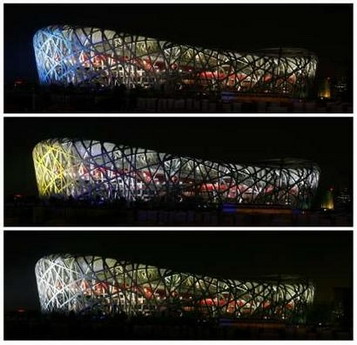 The National Stadium, also known as the Bird's Nest, is lit in different colours in this combo on the eve of the Lunar New Year in Beijing February 6, 2008. The 91,000-seat arena, which is scheduled to be finished by the end of March, will host the opening and closing ceremonies as well as athletics at the Aug 8-24. [Agencies]