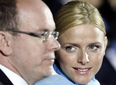 Prince Albert II of Monaco arrives with his friend, Charlene Wittstock, Olympic swimmer of South Africa, for the opening ceremony of the 12th Games of the Small States of Europe in Monaco in this June 4, 2007 file photo. Albert, who will be 50 on Friday, is expected to marry his girlfriend, former South African Olympic swimmer Charlene Wittstock, in September, a French magazine said on Tuesday. [Agencies]