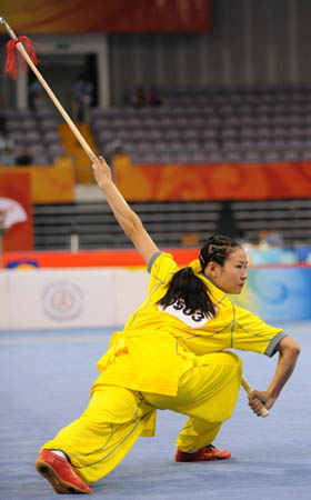 Ma Lingjuan of China performs during women&apos;s Qiangshu (spear play) of the Beijing 2008 Wushu Competition in Beijing, China, Aug. 21, 2008. Ma Lingjuan ranked 1st in women&apos;s Qiangshu competition with a score of 9.85. (Xinhua/Chen Yehua)