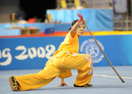 Chen Shao-Chi of Chinese Taipei performs during women&apos;s Qiangshu (spear play) of the Beijing 2008 Wushu Competition in Beijing, China, Aug. 21, 2008. Chen Shao-Chi ranked 4th in women&apos;s Qiangshu competition with a score of 9.50. (Xinhua/Chen Yehua)