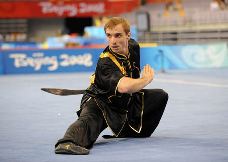 Andrzej Topczewski of Poland performs during men&apos;s Daoshu (broadsword play) of the Beijing 2008 Wushu Competition in Beijing, China, Aug. 21, 2008. Andrzej Topczewski ranked 9th in men&apos;s Daoshu competition with a score of 9.25. (Xinhua/Chen Yehua) 