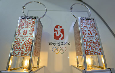 Two lanterns encasing the Olympic flame, originally lit in Ancient Olympia, Greece, flight on board the chartered torch relay plane Airbus A330 on March 31, 2008. The flame on Tuesday left Beijing for Kazakhstan's Almaty, the first stop of the 137,000 kilometers (85,000 miles) worldwide journey.[Xinhua]