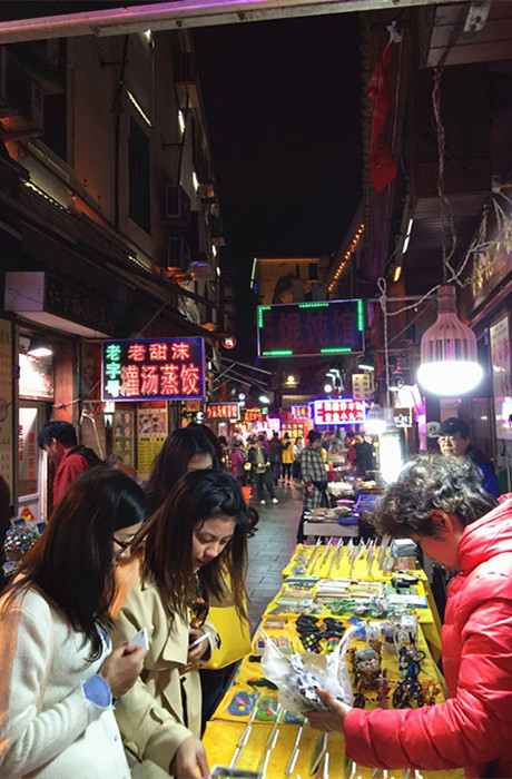 Qingdao, a city with green trees and red roofs