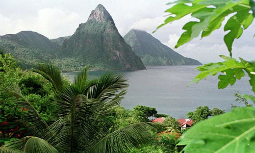 The Pitons, twin peaks that are the remnants of long-dormant volcanoes, dominate the skyline on the Caribbean Island of St. Lucia. 