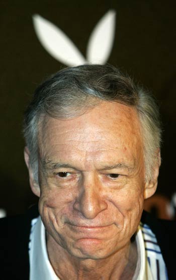 Playboy magazine founder Hugh Hefner arrives for his 80th birthday party in Munich's famous club P1 May 31, 2006. [Reuters]