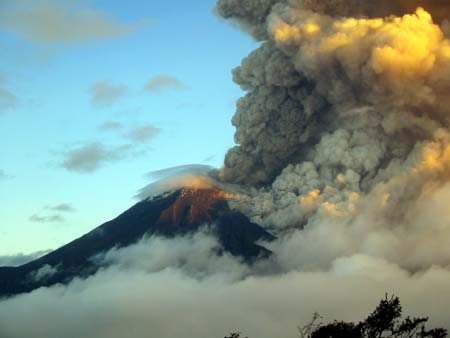 Ash rises from Ecuador's Tunguharua volcano, some 178 km (108 miles) south of Quito July 15, 2006. Ecuador's Tungurahua volcano spewed ash, gases and molten rocks on Friday, forcing authorities to evacuate four nearby villages after the crater registered its most volatile activity since a 1999 eruption. 