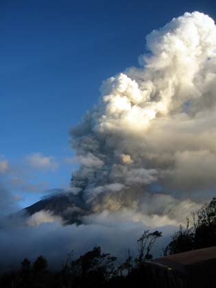 Ash rises from Ecuador's Tunguharua volcano, some 178 km (108 miles) south of Quito July 15, 2006. Ecuador's Tungurahua volcano spewed ash, gases and molten rocks on Friday, forcing authorities to evacuate four nearby villages after the crater registered its most volatile activity since a 1999 eruption. 