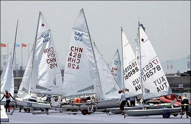 Competitors prepare to set out with their boats at the International Olympic Sailing Center. Qingdao city opened China's largest-ever regatta, the nation's first pre-Olympic event that will serve as a barometer of its readiness for the 2008 Games in Beijing.(