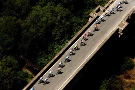 A pack of riders cycle during the third stage of the Tour of Spain cycling race between Cordoba and Almendralejo August 28, 2006. 