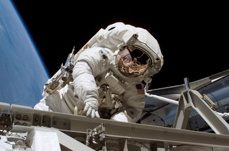 Heidemarie Stefanyshyn-Piper, STS-115 mission specialist, is pictured during a spacewalk with astronaut Joe Tanner (not in frame) from the International Space Station September 12, 2006.