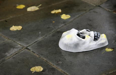 A skeleton mask, used by a pensioner during a National Pensioners Convention lobby demonstration, lies on the ground in central London October 25, 2006. The pensioners are calling for an immediate restoration of links with earnings, currently not due until 2012, to help pensioners who are currently struggling to pay bills.