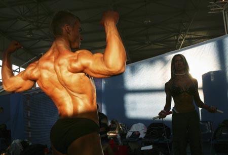 Athletes warm up during World Fitness championship in the northern Greek town of Kavala November 5, 2006. Picture taken November 5, 2006.