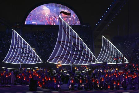 Performers push dhows across the Khalifa Stadium during an enactment of the story of Sinbad the Sailor at the closing ceremony of the 15th Asian Games in Doha December 15, 2006. 