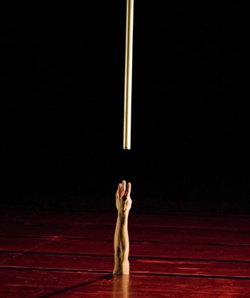 A member of theatre dance company CIE 111 of France performs during their latest show 'Plus Ou Moins L'infini' (More or Less, Infinity) at the Belem Cultural Centre in Lisbon December 14, 2006. The company was created by Aurelien Bory, a former student of physics and acoustics turned actor and is directed by American musician and experimental theatre maker Phil Soltanoff.