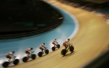 Members of England's cycling team train at the velodrome in Melbourne, Australia March 13, 2006. The team is preparing for the Commonwealth Games which begin March 15. 