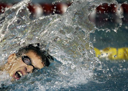 Uruguay's Martin Kutscher swims on his way to the gold medal in the men's 200m freestyle final at the South American Games (Odesur) in Buenos Aires November 15, 2006. 