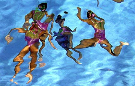 Mexico's synchronized swimming team perform their routine in the team event final at the Central American and Caribbean games in Cartagena, Colombia July 26, 2006. Mexico's team won the gold medal. 