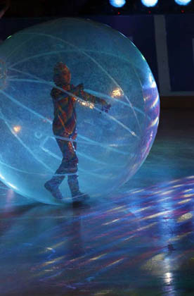 A girl performs inside a plastic ball during the opening ceremony of the 6th Asian Winter games in Changchun, in the northeastern province of Jilin January 28, 2007. 