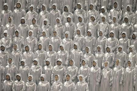 Performers sing during the opening ceremony of the Sixth Asian Winter Games in Changchun, northeastern China's Jilin Province, January 28, 2007.