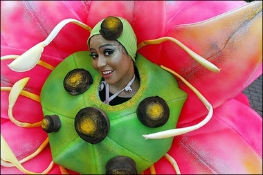 Feeling floral : A participant dressed as a flower, displays her outfit during the Florathon event in downtown Kuala Lumpur. (AFP/Tengku Bahar) 